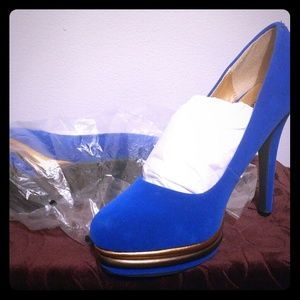 Royal Blue heels with gold trim.